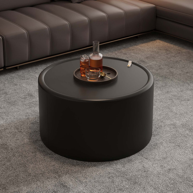 Table basse ronde avec corps en cuir PU et rangement caché pour le salon, Noir