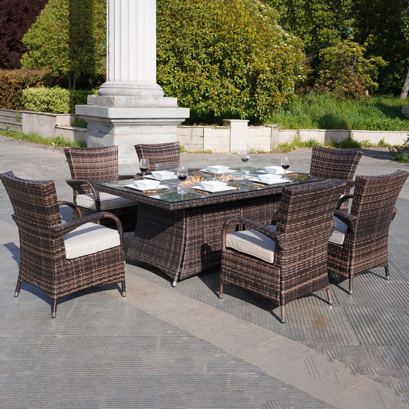 Ardala 6 - Person Wicker Patio Dining Set with Rectangular Table , Cushions Included, Brown