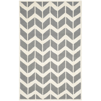 Tapis à chevrons en laine touffeté à la main Ellicott