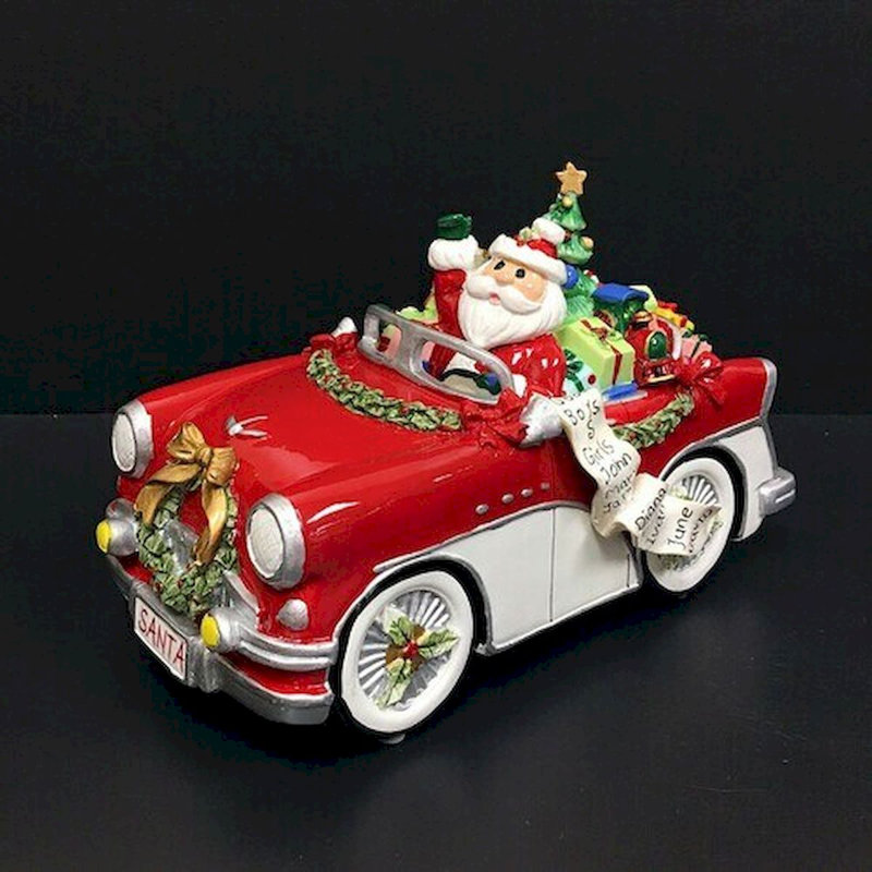 Père Noël dans une voiture classique - Figurine musicale