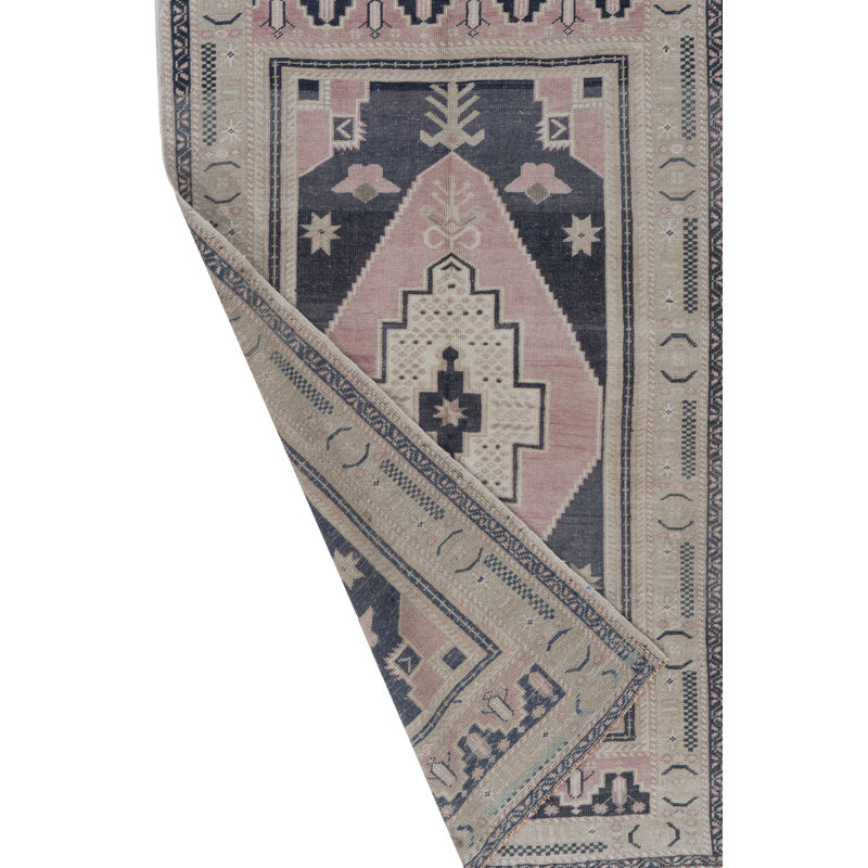 Tapis unique rose clair / bleu / ivoire 3 pi 4 po x 5 pi 6 po Circa
