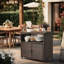 Table de bar en rotin brun avec roulettes