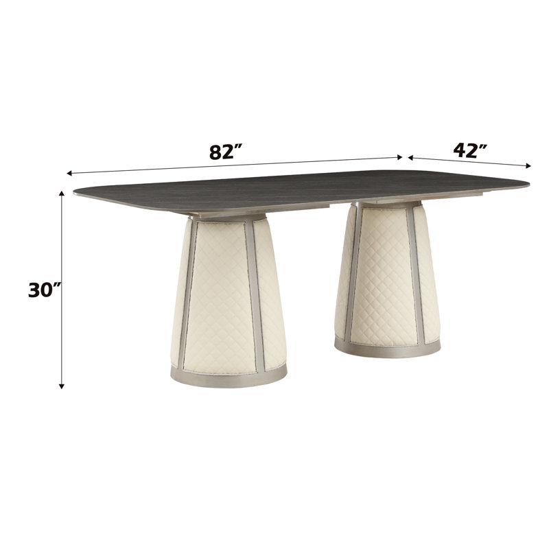 Table de salle à manger avec plateau en pierre frittée et base au fini champagne