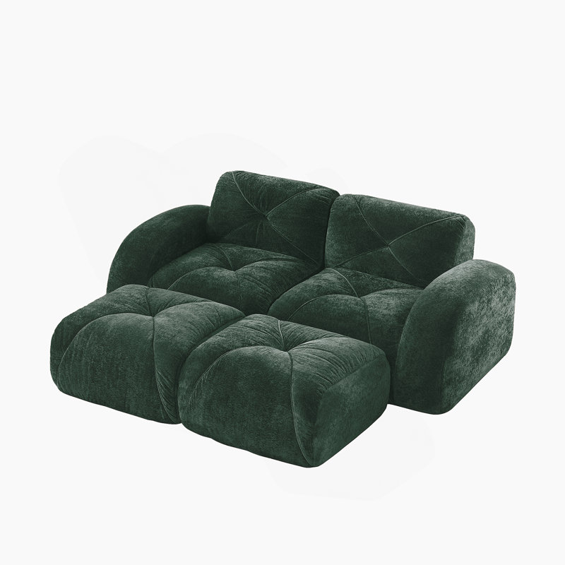 Canapé en forme de U sans os avec revêtement en velours capitonné, support ergonomique et repose-pieds amovibles pour des sièges flexibles.