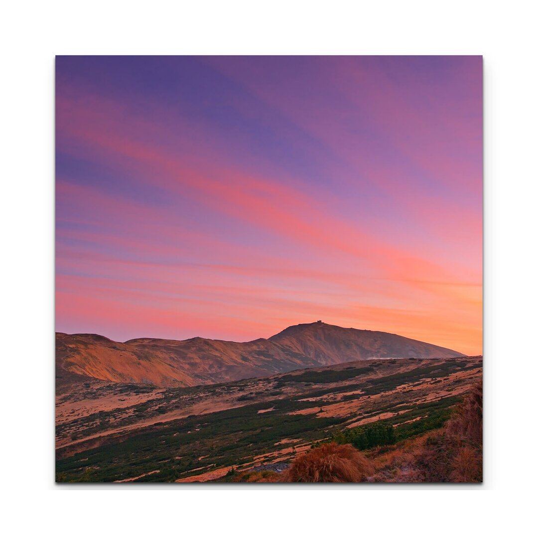 Leinwandbild Sonnenaufgang über einer Gebirgslandschaft