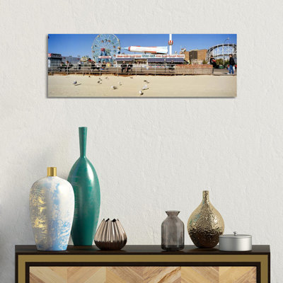 Tourists At An Amusement Park - Wrapped Canvas Panoramic Print