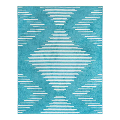 Tapis bleu à motif géométrique