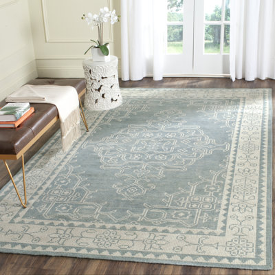 Amariona Hand Knotted Wool/Cotton Oriental Rug in Ivory/Blue