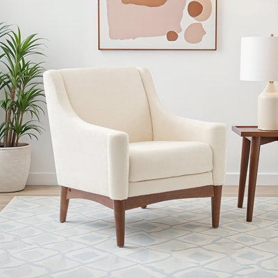 Fauteuil Arshanti avec pieds en bois massif