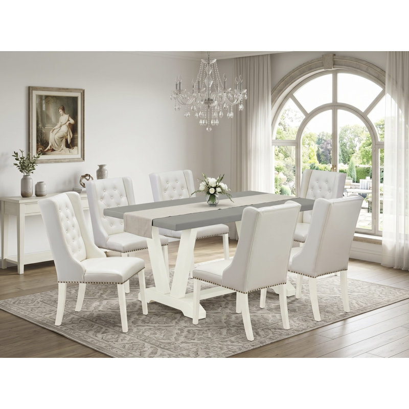 L'ensemble de table de salle à manger 9 pièces comprend 8 chaises de salle à manger en similicuir capitonnées avec des têtes de clous et une table de salle à manger rectangulaire en lin brossé blanc.