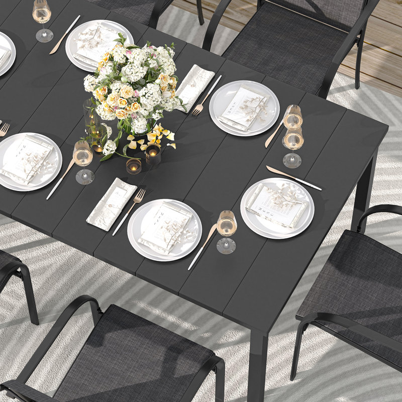 Leyre 6 - Person Patio Dining Set with Rectangular Table, Black/Red