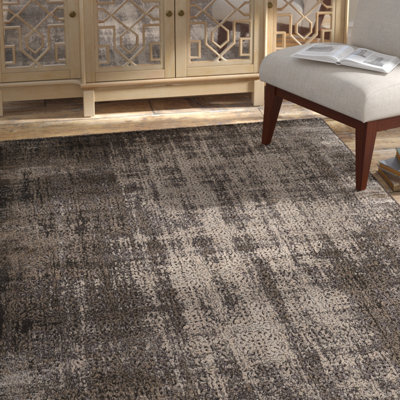 Tapis noir à motif abstrait Zeringue