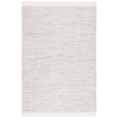 Tohei Hand Woven Wool/Cotton Solid Colour Rug in Ivory/Black