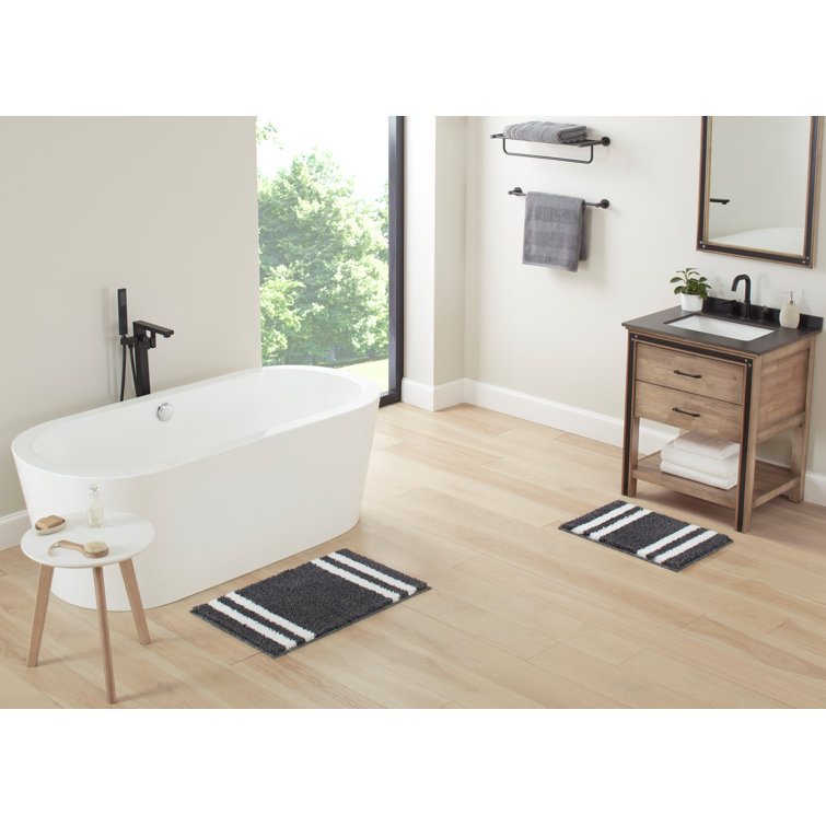 https://assets.wfcdn.com/im/61821333/resize-h755-w755%5Ecompr-r85/2383/238309942/Bath+Rug+with+Non-Slip+Backing.jpg