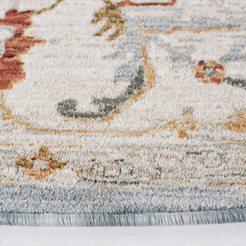 Tapis oriental en polyester bleu / or Xanthi, Rond 6 pi 7 po