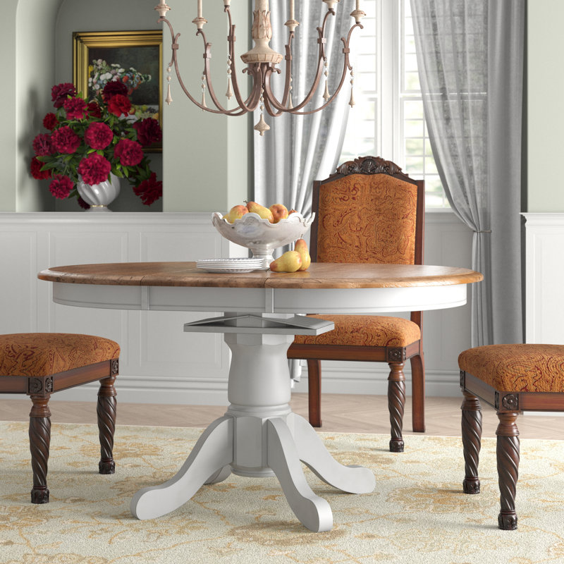 Kinsler Extendable Round Solid Wood Dining Table