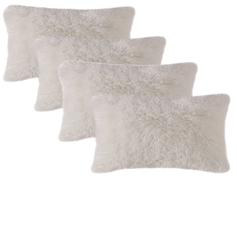Coussin décoratif en fausse fourrure, Crème