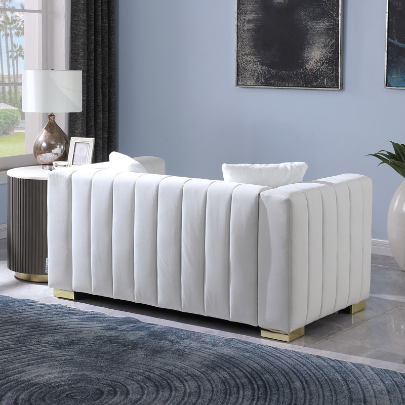 Un canapé-lit moderne sur un Chesterfield traditionnel, causeuse, Blanc