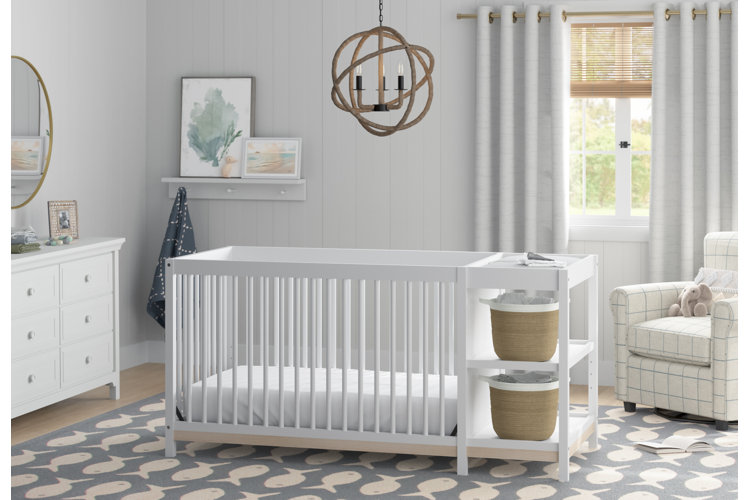 white crib & changer combo in a bright farmhouse nursery