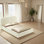 Lit Ardie, pied de lit à profil bas, panneau rembourré beige moelleux