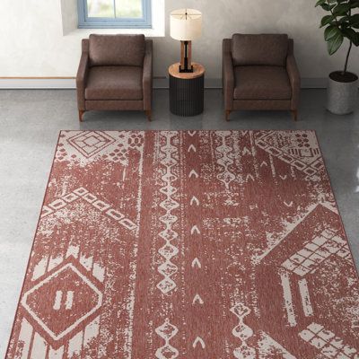 Loreen Geometric Machine Woven Rectangle Polypropylene Indoor / Outdoor Area Rug in Rust Red