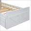 Lit simple en bois avec tête de lit de rangement et prises de courant