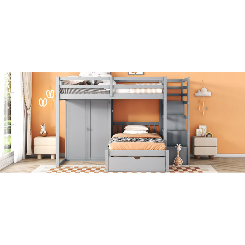 Lit superposé gris avec rangement polyvalent - garde-robe, tiroirs et espace supplémentaire double au-dessus d'un lit simple gris. Garde-robe et pour utilisation. Chambre à coucher. L 97,9 po x l 80 po x H 64,6 po. Bois massif. Roulement robuste