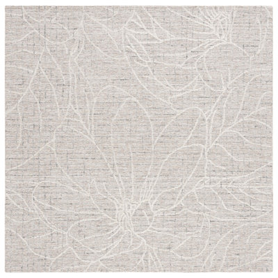 Adysun Hand Tufted Wool/Cotton Floral Rug in Beige/Ivory