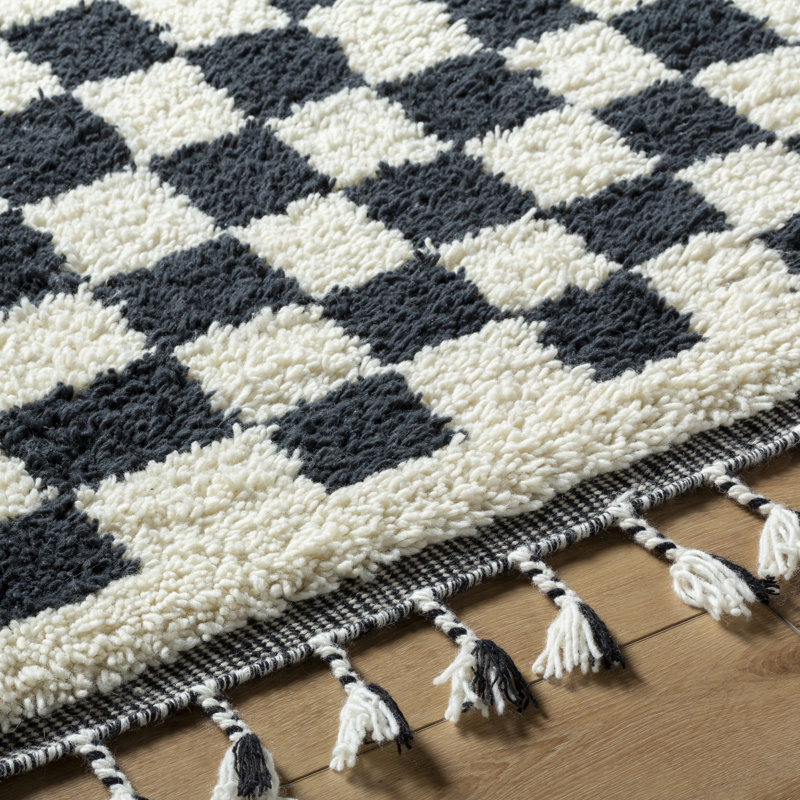 Black and Ivory Geometric Wool Rug with Tassels