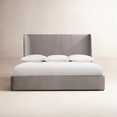 Puro Upholstered Wingback Bed