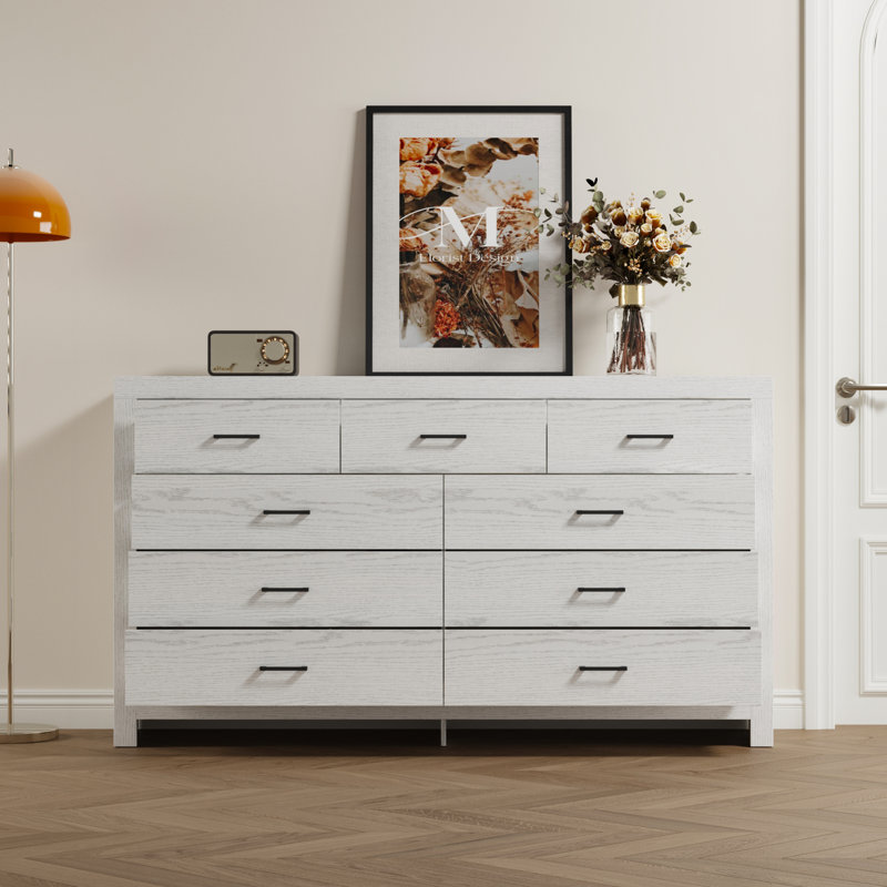 White Nine-Drawer Dresser - Spacious Storage With Black Handles & Smooth Slideways