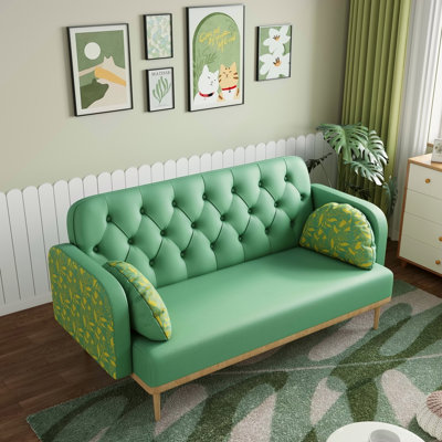 Canapé vert avec motif tulipe