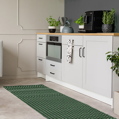 Tapis de couleur verte losanges à lignes classiques