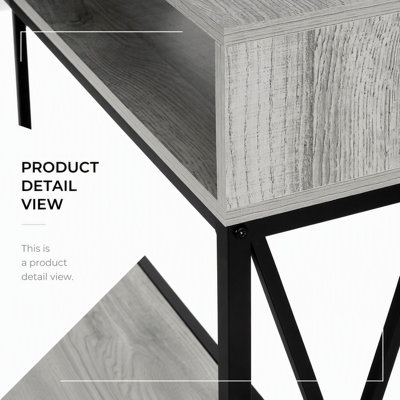 Table d'appoint moderne en stratifié gris avec cadre en métal noir, parfait pour les espaces étroits et les décors contemporains.
