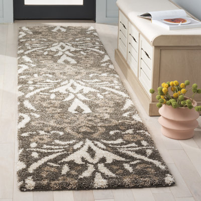 Tapis beige à motif floral Ellyona
