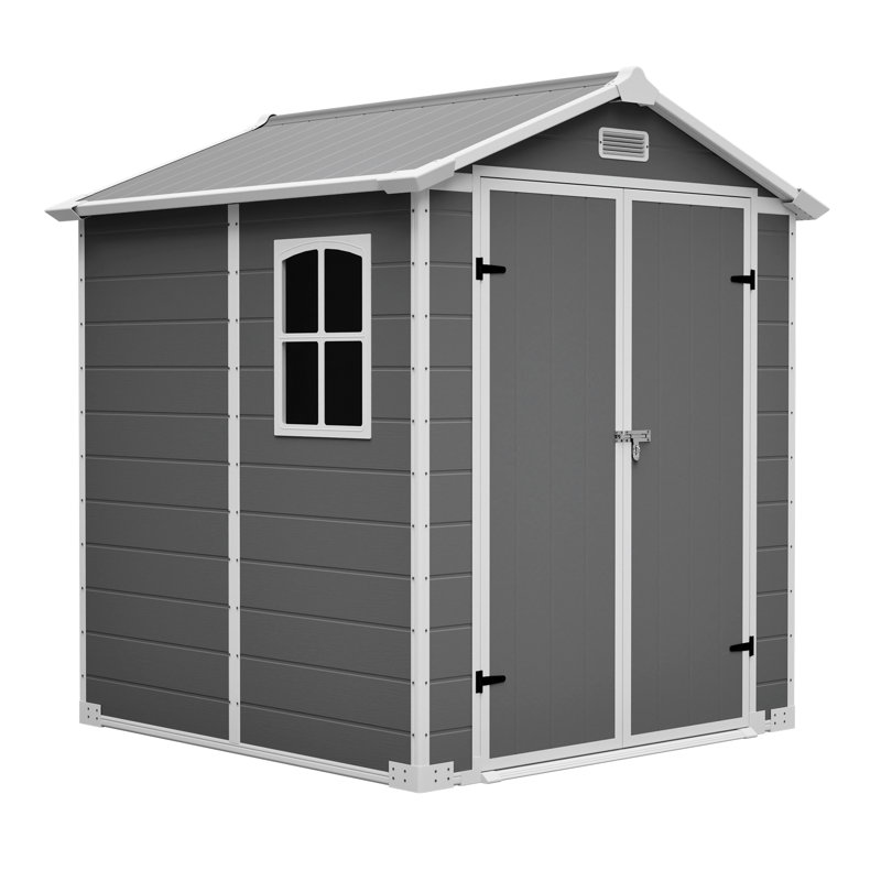 Abri de jardin en résine grise, 1,83 m x 1,83 m, avec porte verrouillable, fond de jardin et fenêtre.