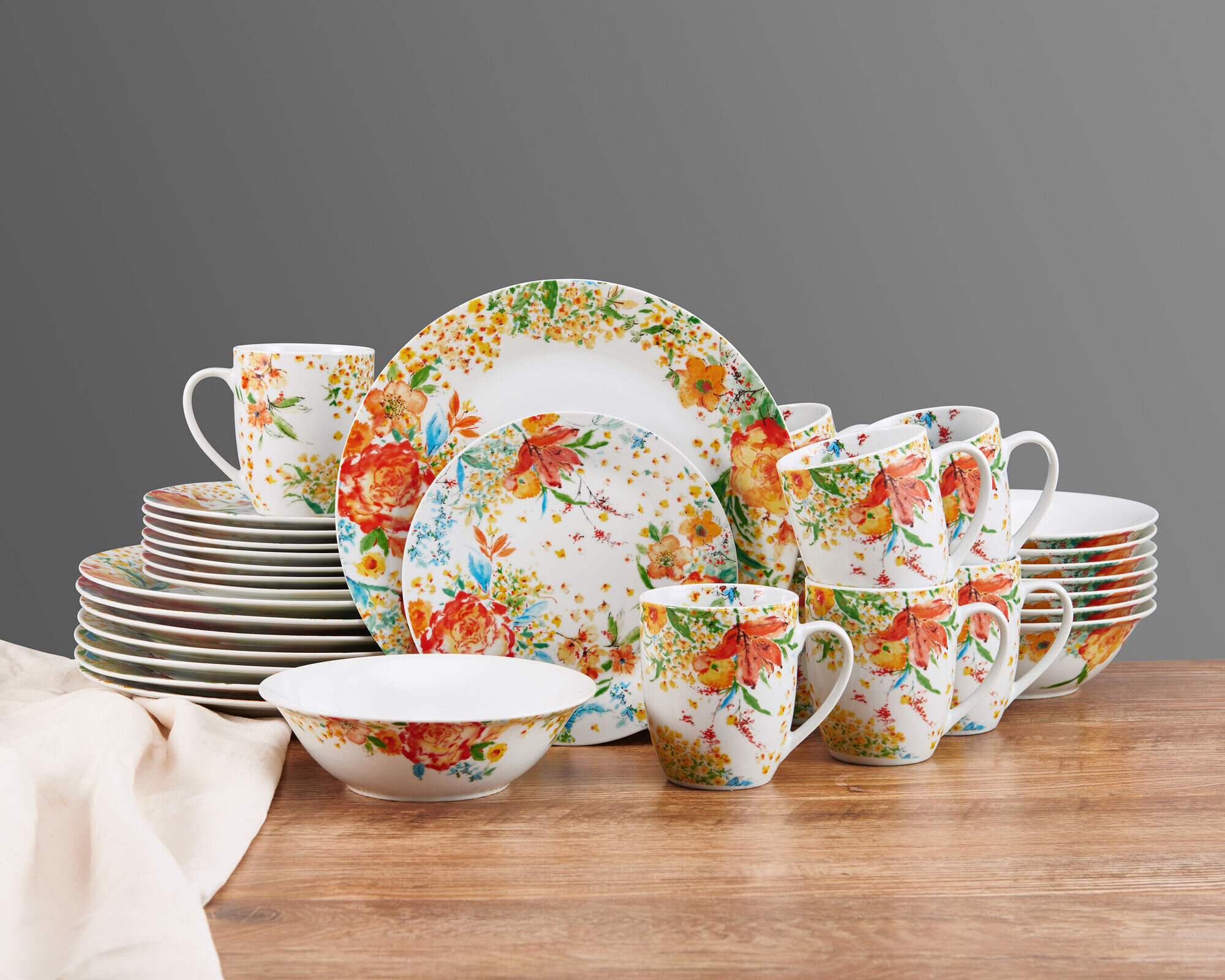 https://assets.wfcdn.com/im/61878025/compr-r85/2014/201428242/fitz-floyd-garden-delight-32-piece-floral-dinnerware-set-service-for-8-multicolored.jpg