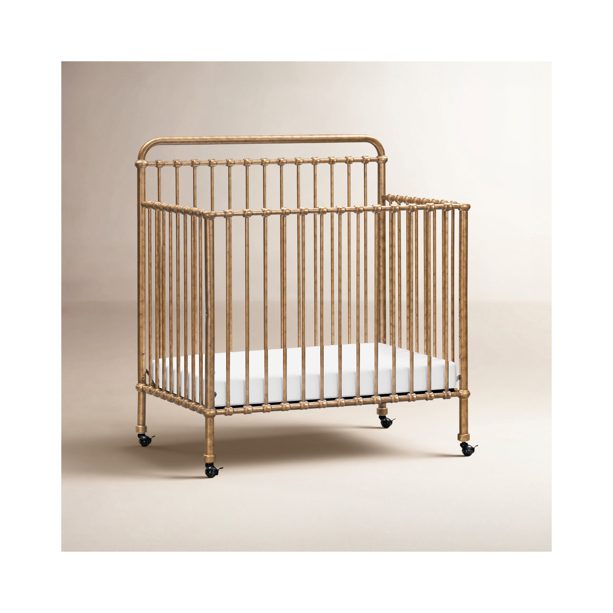 Winston 4-in-1 Convertible Mini Crib, Vintage Gold