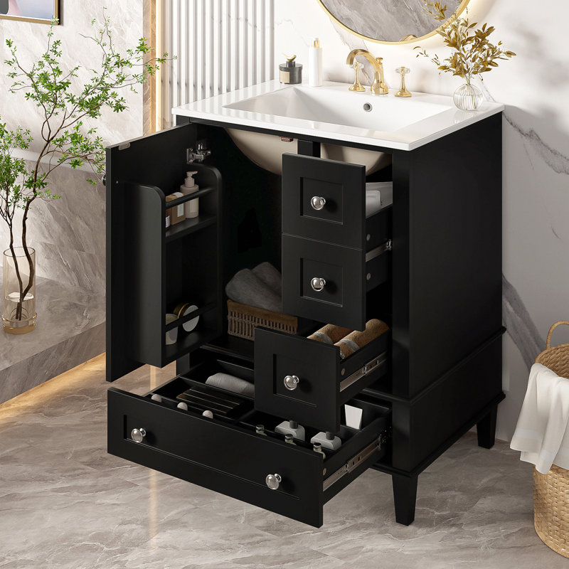 Meuble-lavabo de 24 pouces avec lavabo intégré en céramique, tablette à double couche, tiroirs à fermeture en douceur et porte d'armoire à fermeture en douceur.