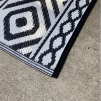 Loon Peak® Rectangle Isael Geometric Machine Woven Plastic Straw Indoor /  Outdoor Area Rug in Black & Reviews