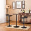 Ensemble de table de bar et tabourets pivotants à hauteur réglable pour une utilisation polyvalente et confortable.