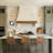 Tevye 1-Light Dimmable Medium Modern Armed Wall Sconce with Copper Finish Shade