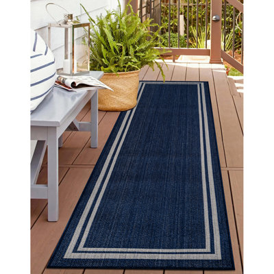 Tapis intérieur / extérieur tissé à plat en jute bleu marine / ivoire Border