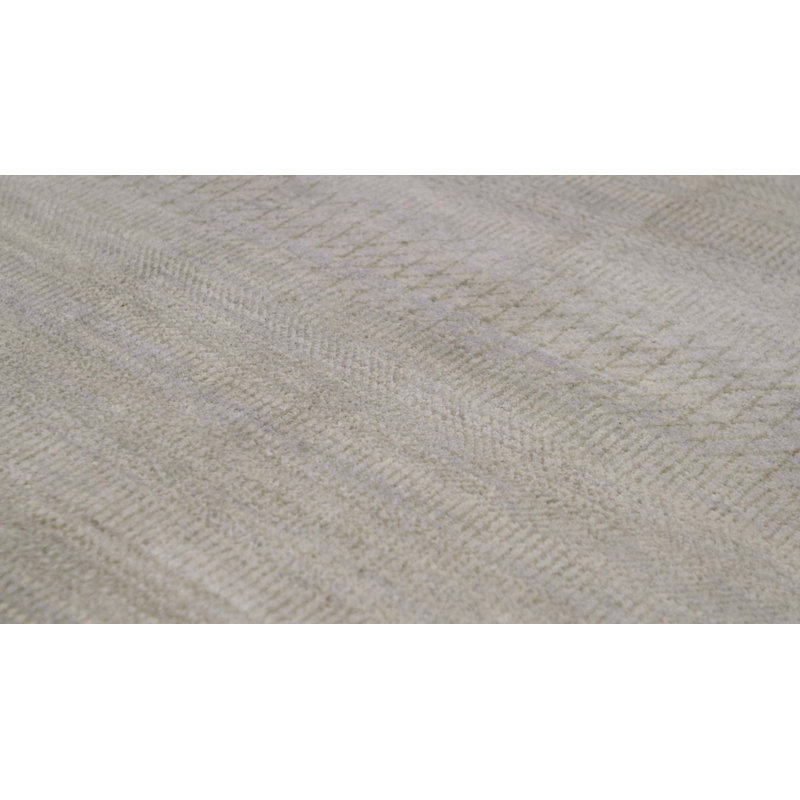 Tapis ivoire noué à la main de haute qualité