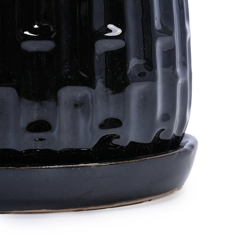 Jardinière en céramique durable, noir brillant, élégance moderne pour les espaces intérieurs et extérieurs