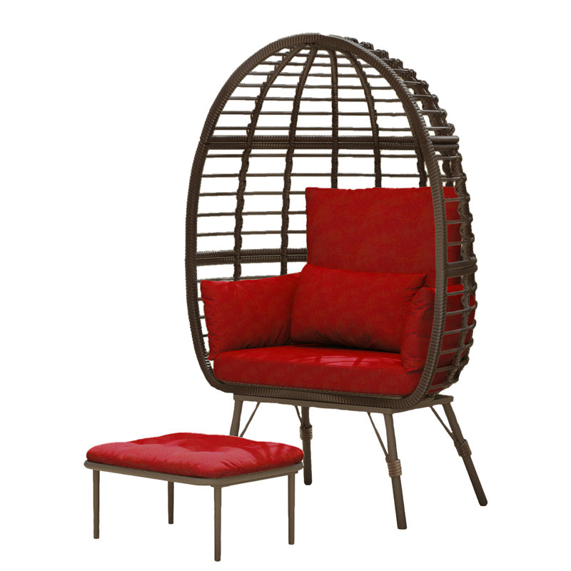 Fauteuil en osier avec repose-pieds Cherryle, Rouge