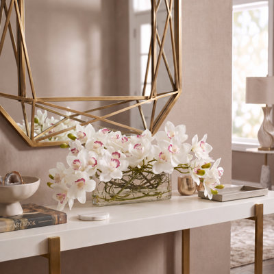Orchids Arranged in Oval Glass Vase with Curly Willow