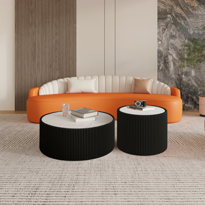 Table basse moderne en cuir fritté avec dessus en pierre