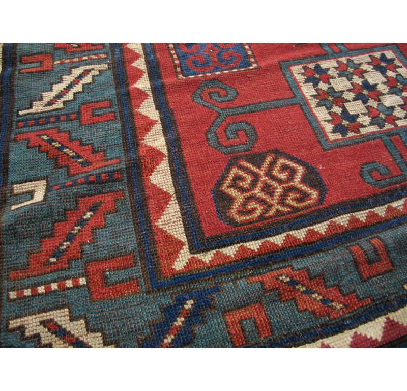 Sensational Red and Blue Color with Geometric Design Antique Caucasian Rug
