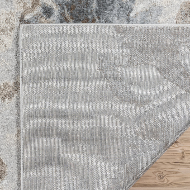 Gray and Beige Floral 8' x 10' Synthetic Area Rug